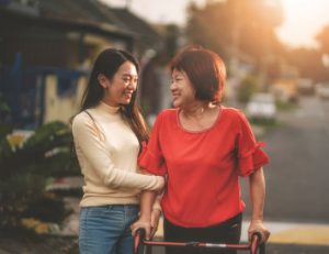 Mother and daughter walking