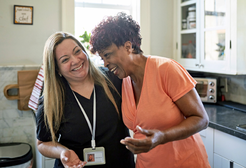 Healthcare worker and woman talking